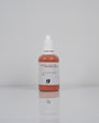 Stone Pigments Collection: frasco del pigmento Coral Valley sobre fondo blanco