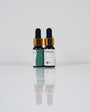 Aqua Pigments Collection: frascos del pigmento Esmeralda sobre fondo blanco