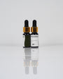 Aqua Pigments Collection: frascos del pigmento Verde Doñana sobre fondo blanco