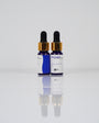 Aqua Pigments Collection: frascos del pigmento Santorini sobre fondo blanco
