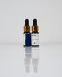 Aqua Pigments Collection: frascos del pigmento Índigo sobre fondo blanco